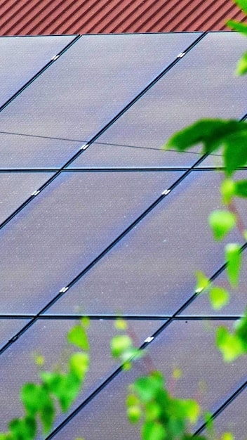 A close-up on solar panels installed on a residential roof, highlighting the clean technology and renewable energy aspect.