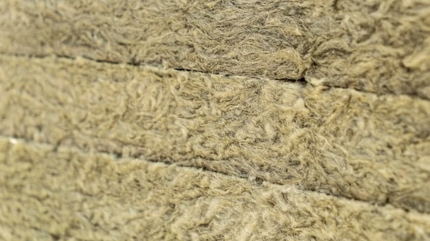 A close-up of hempcrete blocks showing the texture and composition of hemp fibers mixed with lime, demonstrating its potential as an eco-friendly insulation material.