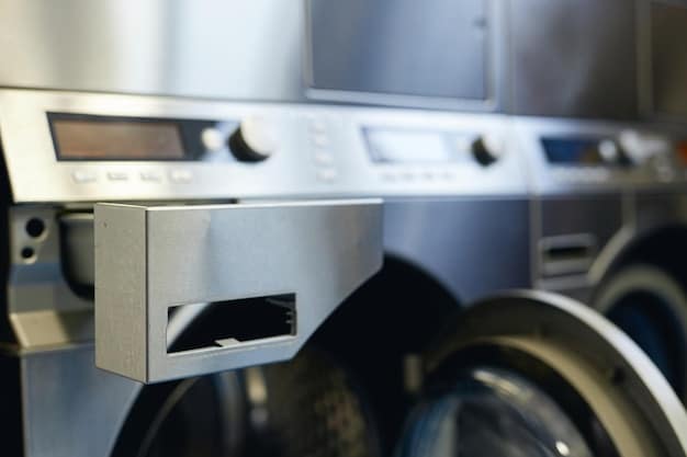A modern laundry room featuring an energy-efficient washing machine and dryer. The washing machine has a digital display showing water and energy usage statistics.