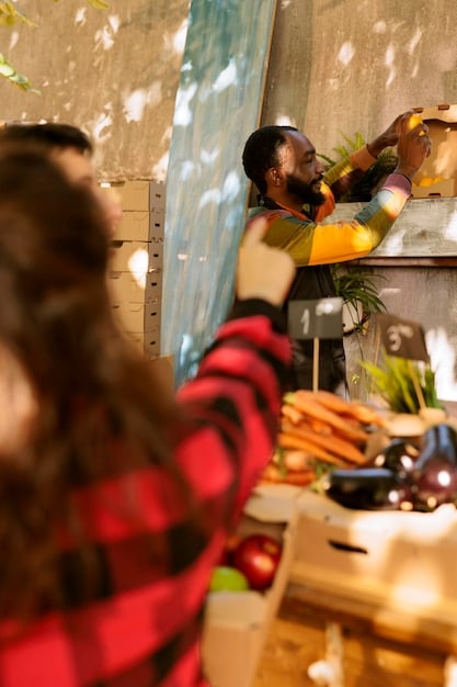 An image depicting a local artisan selling handcrafted goods at a market, showcasing the beauty of supporting local communities through eco-friendly tourism.