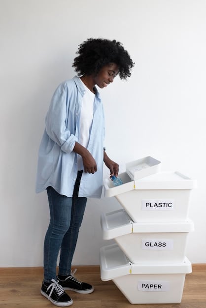 A close-up shot of someone separating different types of waste into recycling bins. The bins are clearly labeled, and the person is diligently sorting items.