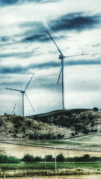A collage of images representing various climate solutions, including solar panels, wind turbines, electric vehicles, sustainable agriculture practices, and restored forests. The images highlight the diverse range of technologies and strategies available for mitigating climate change.