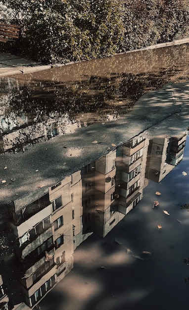 A photograph showing the aftermath of a major hurricane, with widespread flooding, damaged buildings, and debris-strewn streets. The image highlights the destructive power of extreme weather events and their impact on communities.